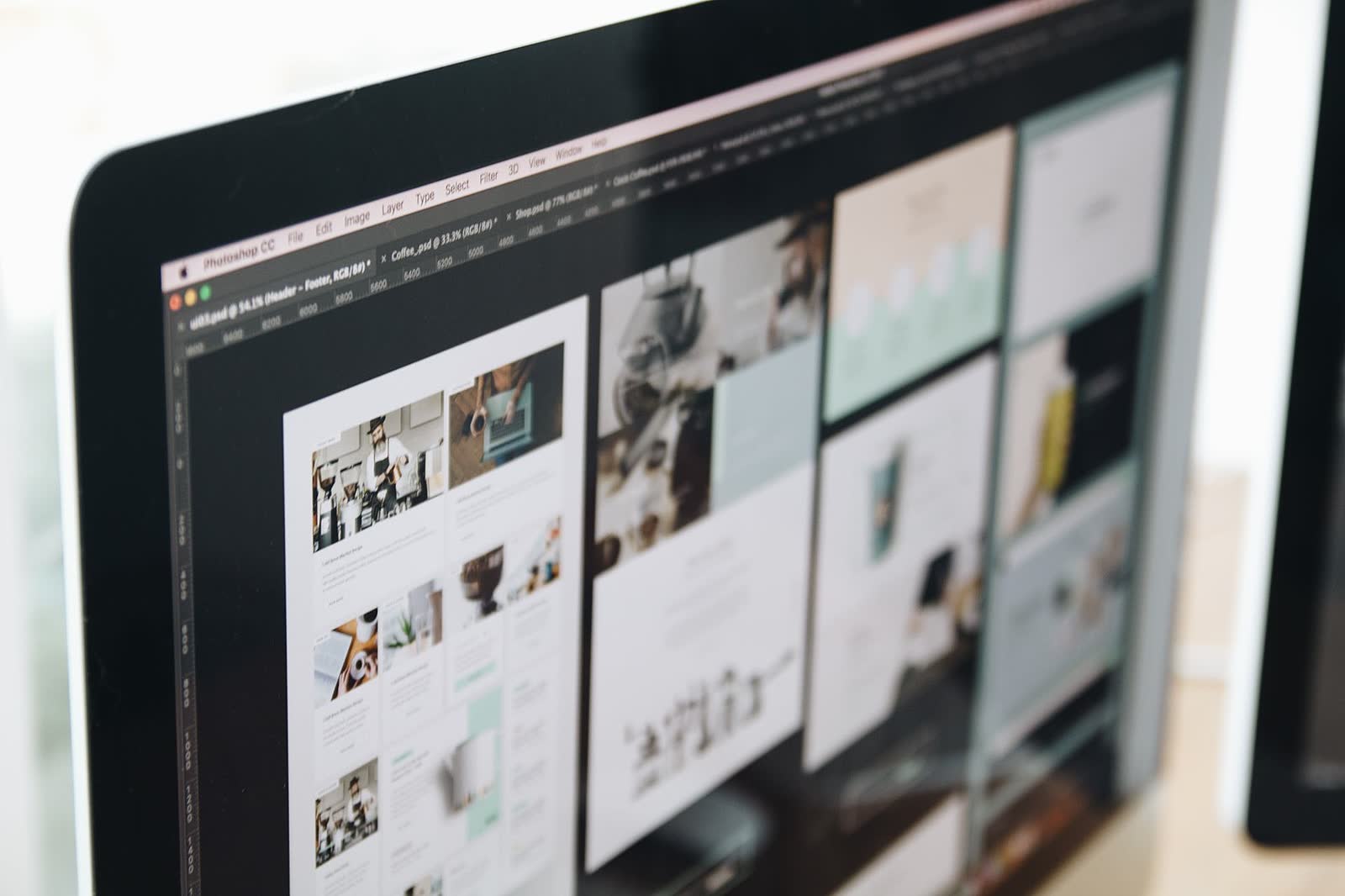 Graphic design workspace with print layouts
