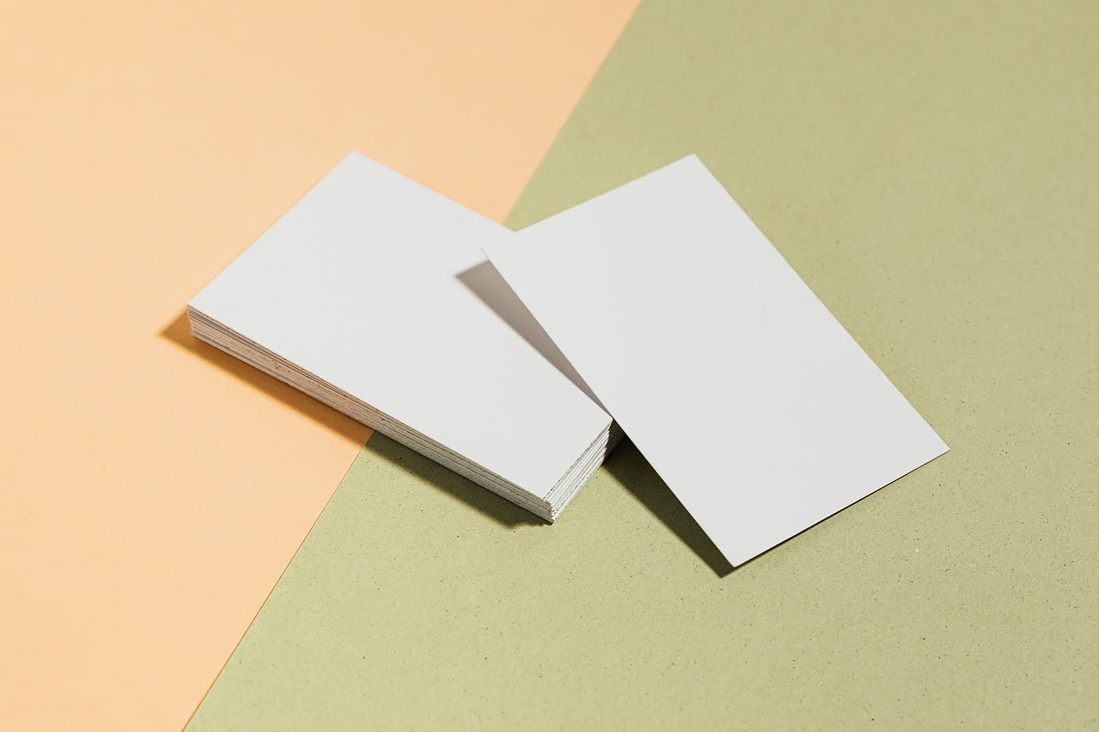 Business cards fanned out on a desk